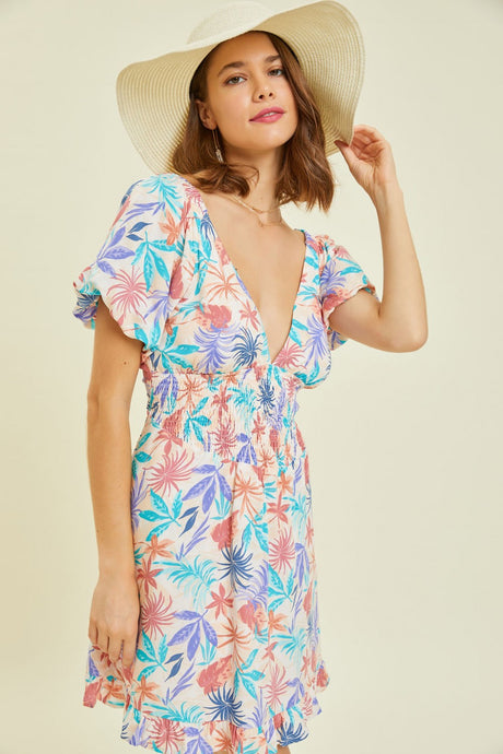 Tropical Printed V-Neck Mini Dress with Bubble Sleeves, Pockets, Smocked Waist, and Back Tie Detail