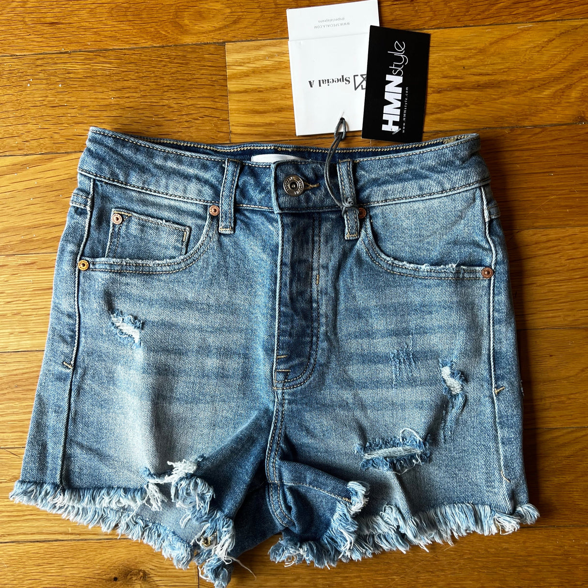 High Rise Shorts with Distressed and Inner Side Button